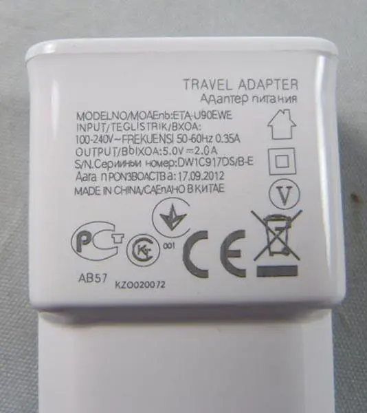 Photo de l’avis officiel: Travel Adapter Chargeur — risque: Choc électrique