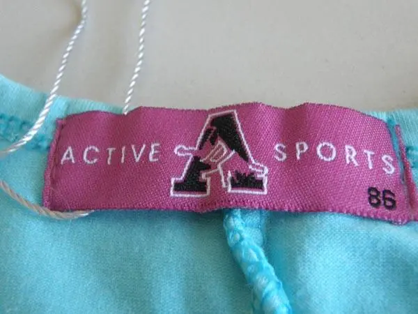 Foto do aviso oficial: A - Active Sports T-shirt das meninas — risco: Engasgamento