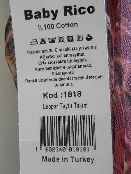Foto do aviso oficial: Baby Rico Roupa de rapariga — risco: Engasgamento