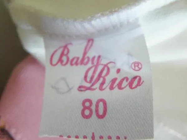 Foto do aviso oficial: Baby Rico Roupa de rapariga — risco: Engasgamento
