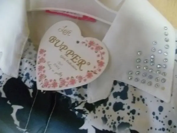 Foto aus der offiziellen Meldung: Bupper Kinderbekleidung Set — Risiko: Ersticken