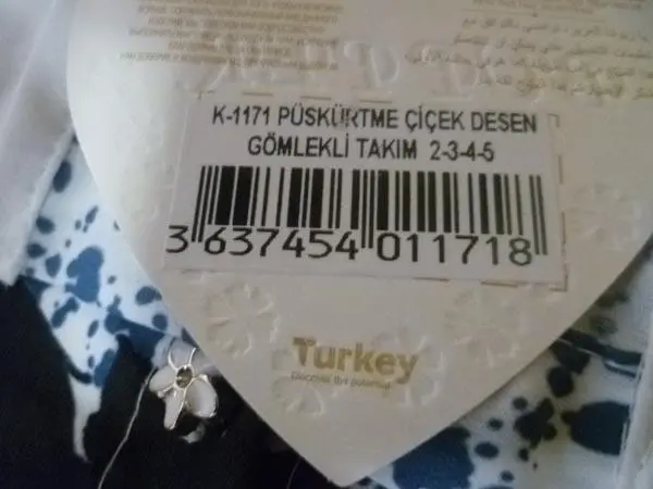 Foto aus der offiziellen Meldung: Bupper Kinderbekleidung Set — Risiko: Ersticken