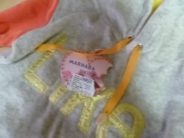 Foto uit de officiële melding: MARHABA Kinderkleding sets — risico: Verwonding & Verwurging
