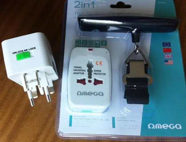 Foto do aviso oficial: Omega TRAVEL POWER ADAPTOR + TRAVEL SCALE Adaptador de plugue de viagem — risco: Choque elétrico