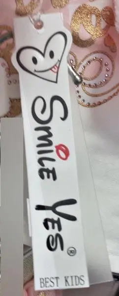 Foto uit de officiële melding: Smile Yes -  Best Kids Meisjes kleding set — risico: Verwurging