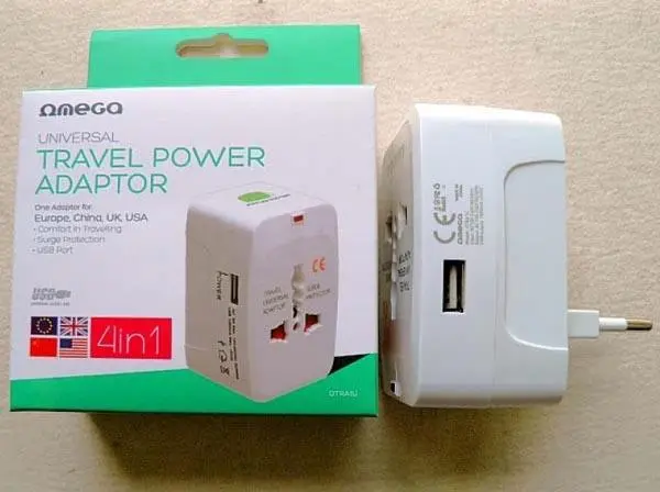 Foto aus der offiziellen Meldung: Omega 4 in1 Universal Travel Power Adaptor Reisestecker Adapter — Risiko: Elektrischer Schlag