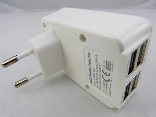 Foto uit de officiële melding: USB Power Adapter With Four USB Power Port USB-voedingsadapter — risico: Elektrische schok & Brand