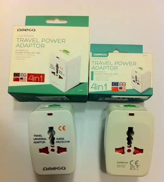 Foto aus der offiziellen Meldung: Omega 4in1 Universal Travel Power Adaptor Reisestecker Adapter — Risiko: Elektrischer Schlag