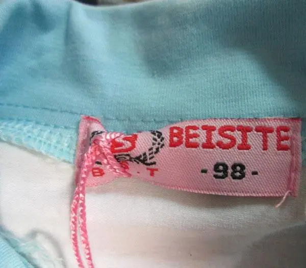 Foto aus der offiziellen Meldung: B.S.T. (beisite) lány póló ('Girls' T-shirt') Mädchen T-Shirt — Risiko: Ersticken