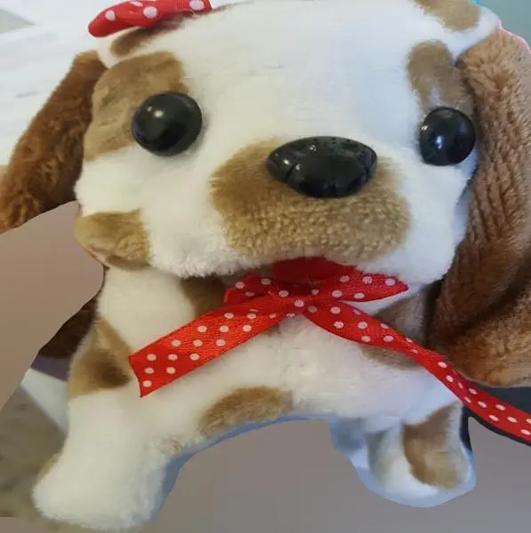 Foto dell’avviso ufficiale: OU Xiang Modish dancing dog Cane peluche con luce e suono — rischio: Ostruzione delle vie aeree