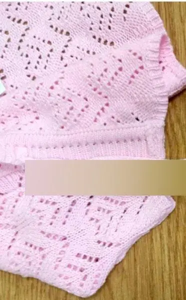 Foto do aviso oficial: BABYLUNA Sobretudo de lã infantil — risco: Ferimentos