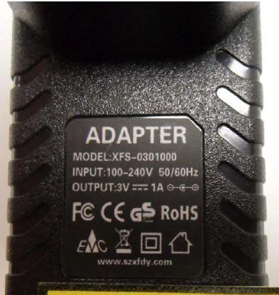 Foto aus der offiziellen Meldung: Shenzhen Xuan Feng Electronic Co ADAPTER Stromversorgung — Risiko: Elektrischer Schlag & Feuer