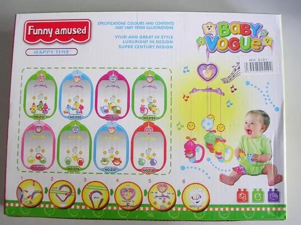 Photo from the official notice: Funny Amused Baby Vogue babies' musical mobile — choking risk