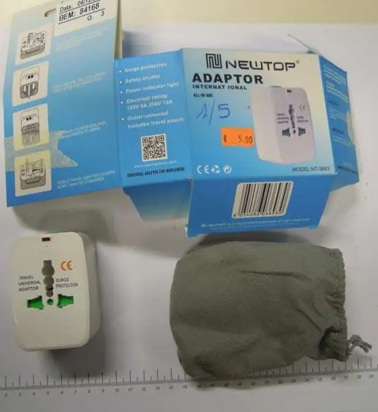 Foto do aviso oficial: Newtop ADAPTOR International Adaptador de plugue de viagem — risco: Choque elétrico