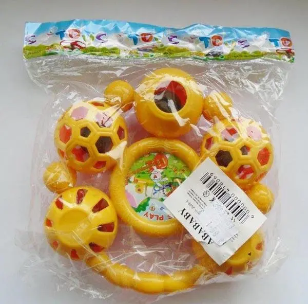 Foto do aviso oficial: Abababy PLAY THE SONG / LET´S PLAY Brinquedo de chocalho — risco: Engasgamento