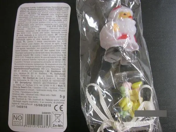 Foto dell’avviso ufficiale: Sweet's Fun Flash Santa Giocattolo di plastica con dolci — rischio: Rischio chimico & Ostruzione delle vie aeree