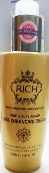 Photo from the official notice: Rich (1) Pure Luxury Moisture Leave-in Conditioner ; (2) Pure Luxury Argan Curl Enhancing Cream hair care prod — chemical risk