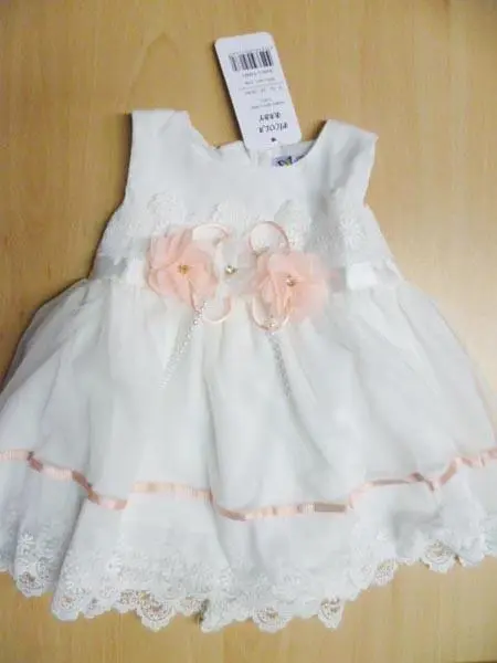 Photo de l’avis officiel: Picola Robe d’enfant — risque: Étouffement & Blessures