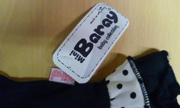 Foto uit de officiële melding: Baray Kinderkleding set — risico: Verwonding & Verwurging