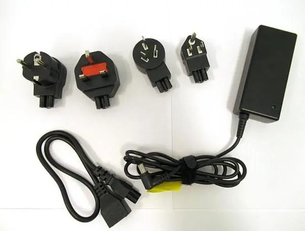 Photo from the official notice: 1) Cameron sino, 2) Unknown 1) Power adapter 2) Replacement AC Adapter computer power supply — electric shock risk