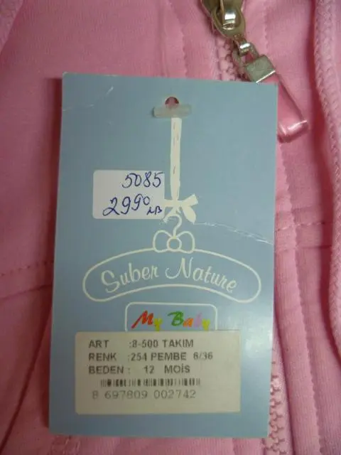 Foto do aviso oficial: Suber Nature Conjunto de roupas infantis «Meu bebé» — risco: Estrangulamento