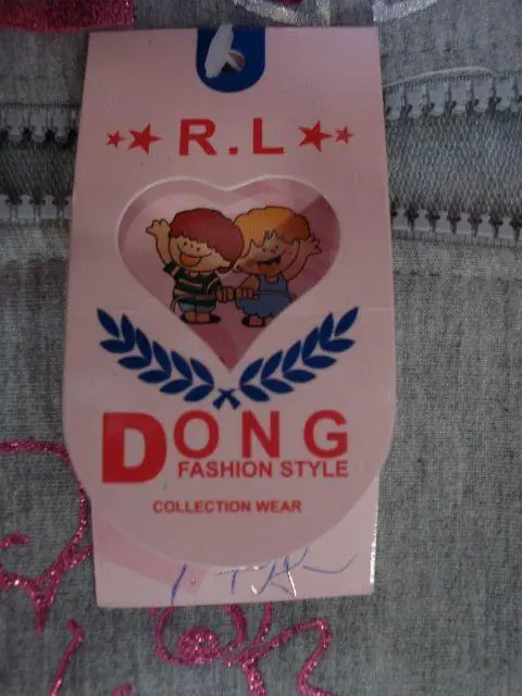 Photo from the official notice: DONG FASHION STYLE girl’s sweatshirt — strangulation risk