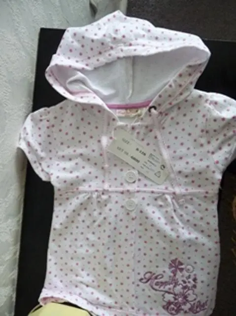 Foto uit de officiële melding: - Knot So Bad;- Dominka. Kinderkleding — risico: Verwurging