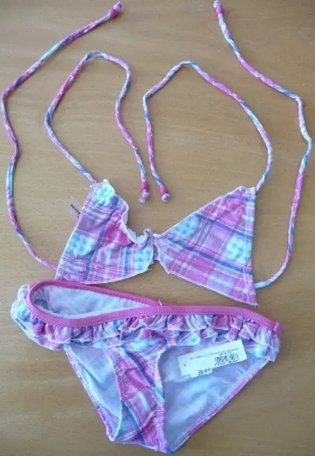 Foto uit de officiële melding: Reserved Kids Kinderkleding — risico: Verwonding & Verwurging