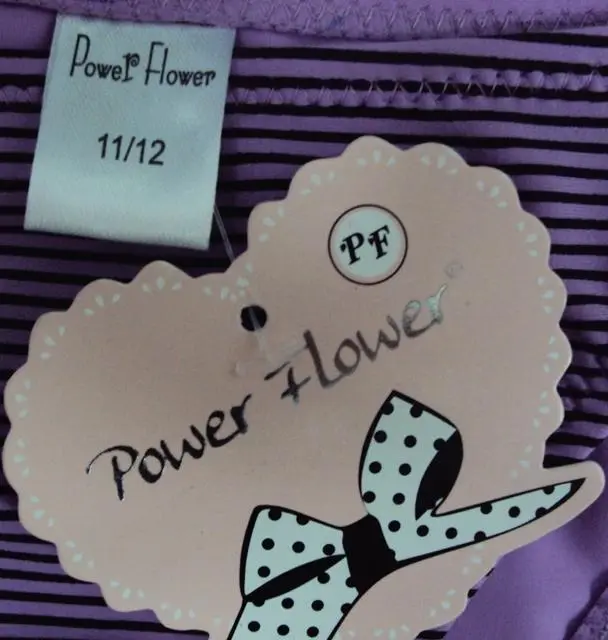 Foto uit de officiële melding: Power Flower Kinderbikini — risico: Verwonding & Verwurging