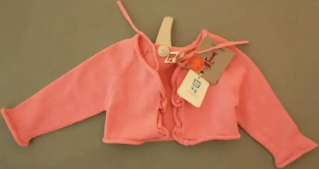 Photo from the official notice: TUC TUC babies’ knitted jacket "dragonfly" — strangulation risk