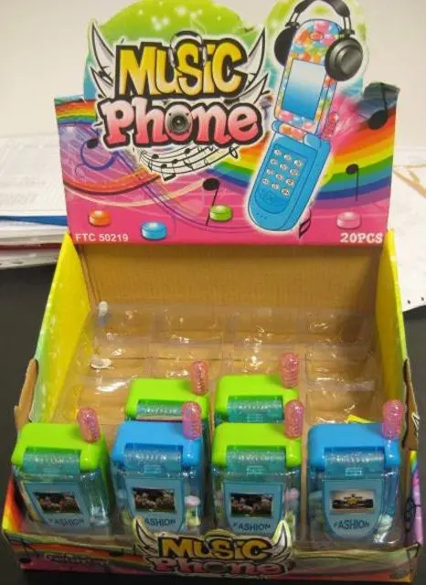 Foto do aviso oficial: Fantasy Toys Brinquedo telemóvel com doces «Music phone»  ; — risco: Lesões auditivas