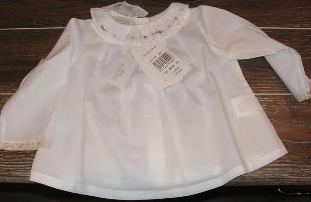 Foto do aviso oficial: NANOS BABY Blusas de bebé ‘Camisa De Bebé’ (shirt do bebé) — risco: Engasgamento