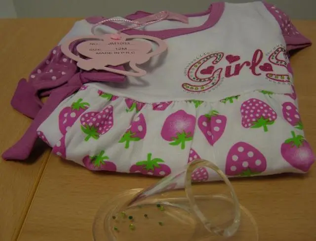 Photo de l’avis officiel: Jian Qi Robe de bébé — risque: Étouffement & Blessures