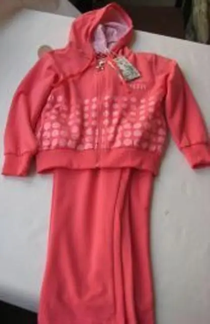 Foto uit de officiële melding: Moga Kinderkleding — risico: Verwonding & Verwurging