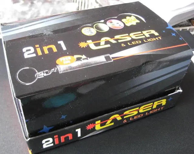 Foto uit de officiële melding: Laserpointer „Key-ring 2 in Laser &amp; Led Light” — risico: Aantasting van het gezichtsvermogen