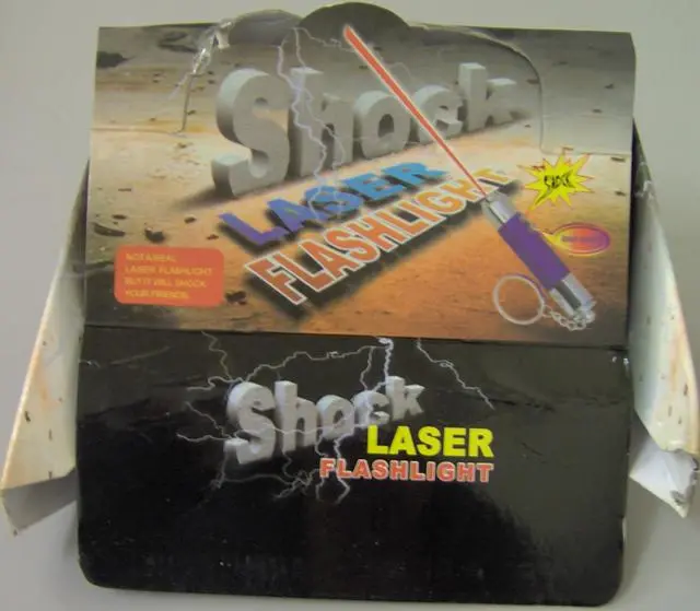 Photo from the official notice: Shock laser pointer key-ring "laser flashlight" — damage to sight risk