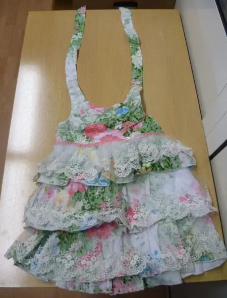 Foto do aviso oficial: CATIMINI Vestido da menina — risco: Estrangulamento