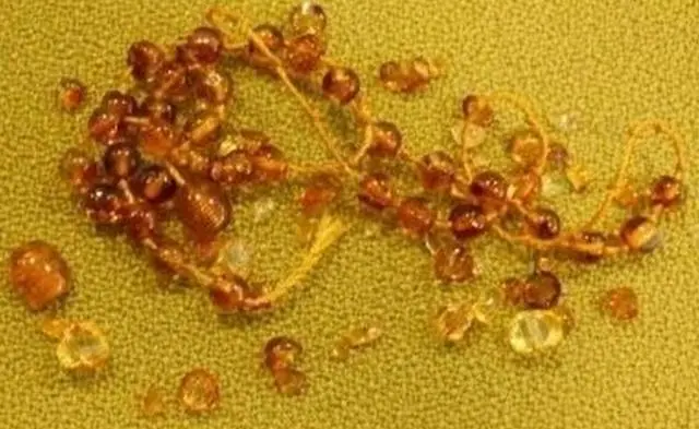 Foto del aviso oficial: Amber Pumpkin Amber Teething Jewellery Collar de dentición ámbar — riesgo: Atragantamiento