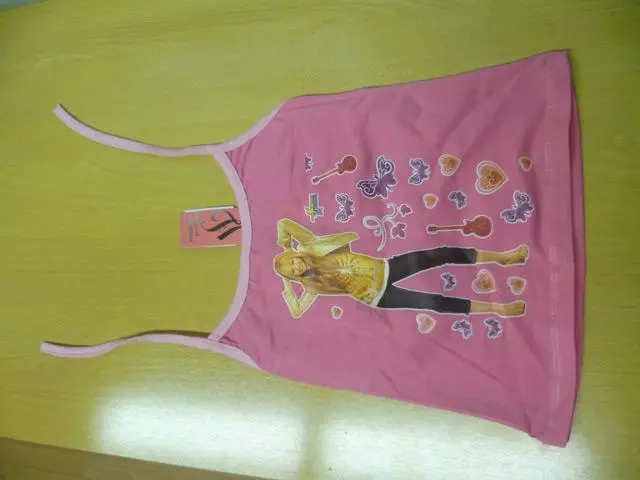 Foto del aviso oficial: Hannah Montana (THE PRODUCT MAY BE COUNTERFEIT) La parte superior de las chicas — riesgo: Estrangulamiento (A12/1285/12)