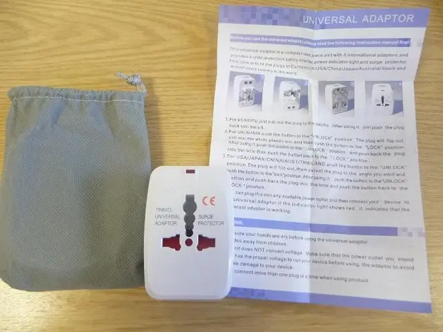 Foto aus der offiziellen Meldung: Adaptor International All-in-one Reiseadapter &amp; #13; &amp; #13; — Risiko: Elektrischer Schlag (A12/1352/12)