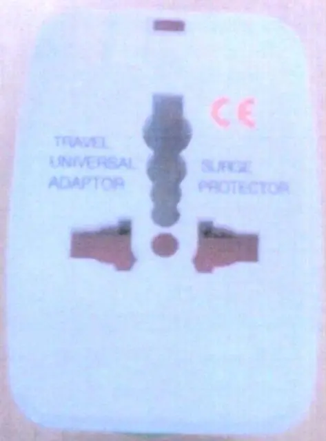 Foto uit de officiële melding: Universal Plug Adaptor De adapter van de reisstop  &amp; #13; — risico: Elektrische schok