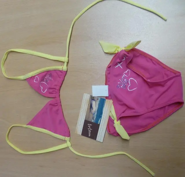 Foto do aviso oficial: Lollipop Biquíni das meninas — risco: Estrangulamento