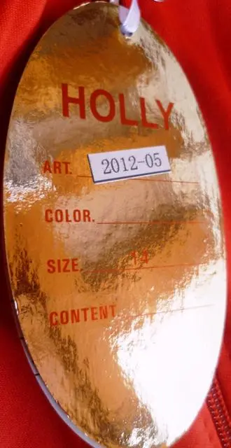 Foto uit de officiële melding: Holly Fashion Kinderkleding set &amp; #13; &amp; # #13; — risico: Verwonding