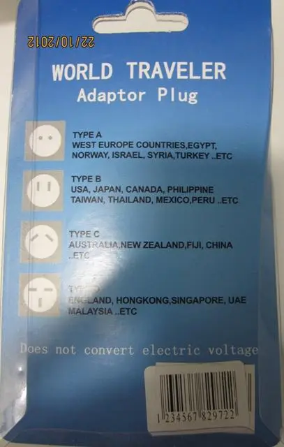 Foto uit de officiële melding: Qi-Zhou Adaptor Universal - World Traveler Adaptor Plug De adapter van de reisstop  &amp; #13; — risico: Elektrische schok (A12/1779/12)