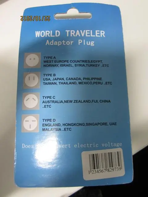 Foto uit de officiële melding: Qi-Zhou Adaptor Universal - World Traveler Adaptor Plug De adapter van de reisstop  &amp; #13; — risico: Elektrische schok (A12/1780/12)