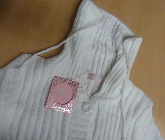 Photo de l’avis officiel: Nice Wear Cardigan pour enfants — risque: Blessures & Etranglement