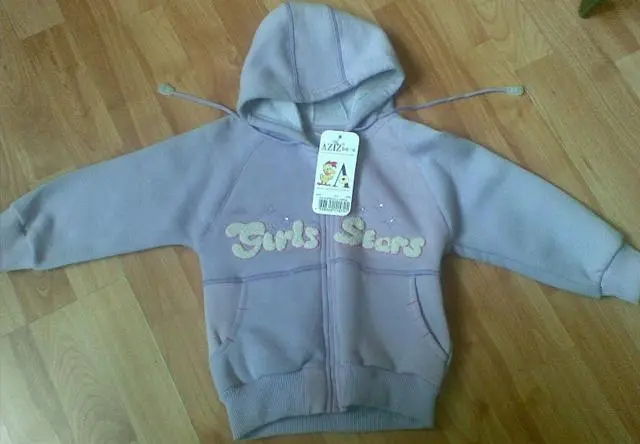 Photo from the official notice: AZIZ BEBE girls' jacket — strangulation risk