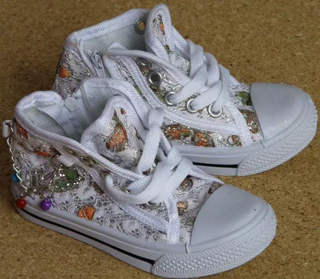 Foto do aviso oficial: CAMO Sapatos infantis — risco: Engasgamento