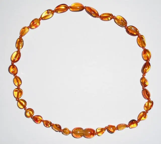 Foto dell’avviso ufficiale: Teething SOS Honey Bean Collana di dentizione ambra e bracciale — rischio: Ostruzione delle vie aeree