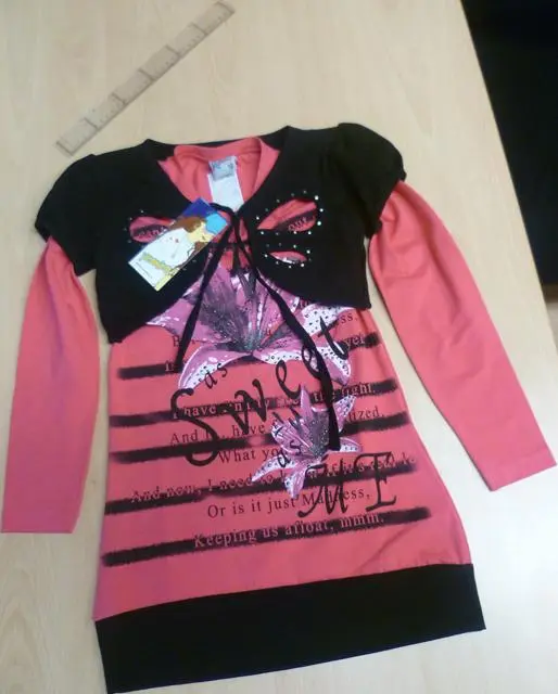 Foto do aviso oficial: Yesmina Conjunto de roupas para meninas — risco: Estrangulamento